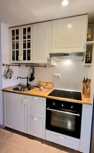 Frangipani - With Terrace & Shared Pool Коральео